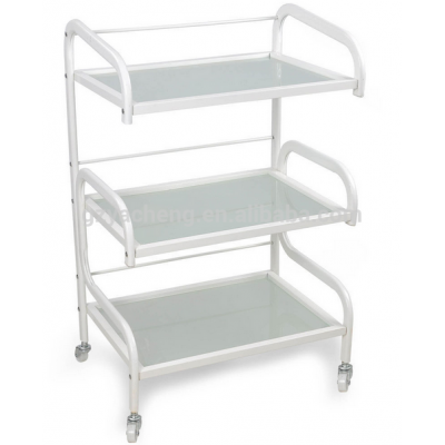 cheaper Glass beauty trolley. the tray is glass and the framework is iron . very durable salon tolley